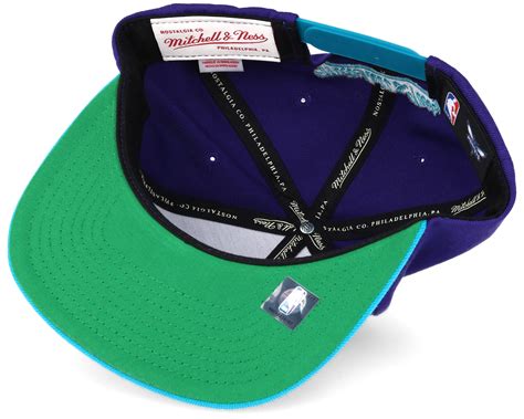 It focuses on offering consumers a range of licensed apparel from the nfl, nba, nhl, and afl; Charlotte Hornets Cursive Script Logo Purple Snapback ...