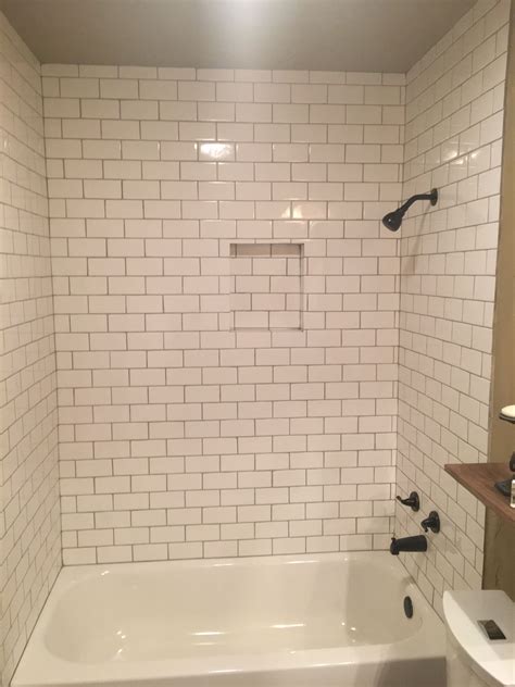 White Subway Tile With Pewter Grout Bathroom Redesign Bathroom Decor Beach House Bathroom