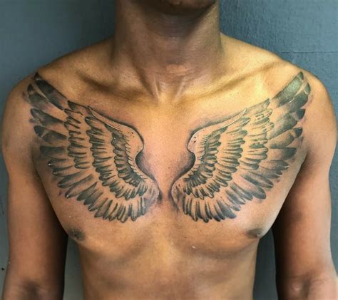 Wing Tattoo Designs On Chest