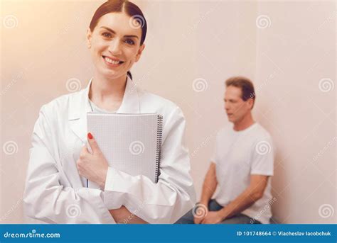 Positive Delighted Medical Worker Looking At Camera Stock Photo Image