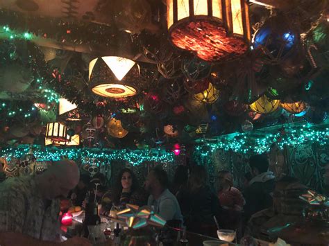 awesome tropical themed tiki bar hidden in another restaurant false idol inside craft