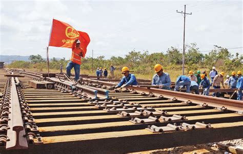 Dropped for making late payment. crec workers building a railway in venezuela provided to china daily