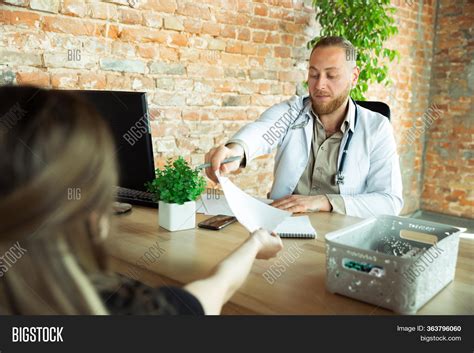 Doctor Consulting Image And Photo Free Trial Bigstock