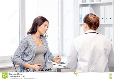 Gynecologist Doctor And Pregnant Woman At Hospital Stock Image Image Of Consulting Expectant