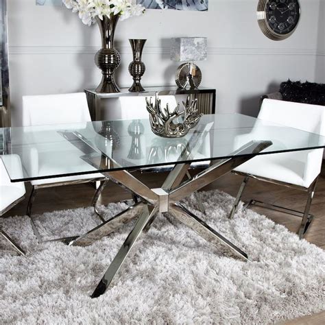Glass surfaces feel clean, sophisticated, and industrial concrete glass top dining table: Debonaire Glass And Chrome Dining Table | Picture Perfect ...