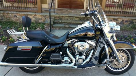 To get the low slung look on the heritage (and most of the other softails) harley gave up the lean angle. Road King vs: Ultra Classic Electra Glide Heritage Softail ...