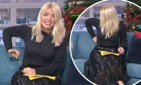 holly willoughby suffers a wardrobe malfunction live on this morning