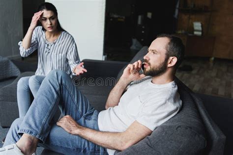 Mad Woman Talking To Her Husband While He Talking By Phone Stock Image Image Of Argue