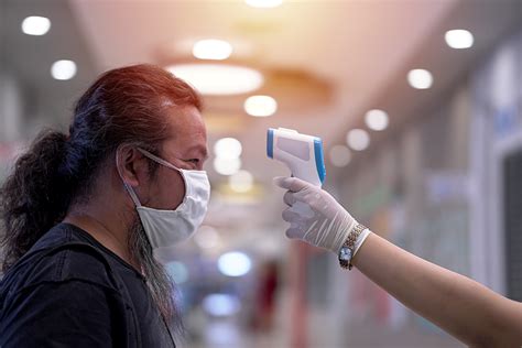 Companies Beef Up Covid 19 Measures With Masks Temperature Checks