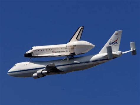 The Space Shuttle Endeavour Mounted Atop Nasas Modified Boeing 747