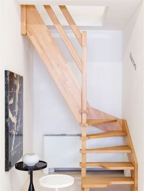 If you are not afraid of colour, you can try with this solution: Best 5 Small Attic Stairs | Roderick Zanini