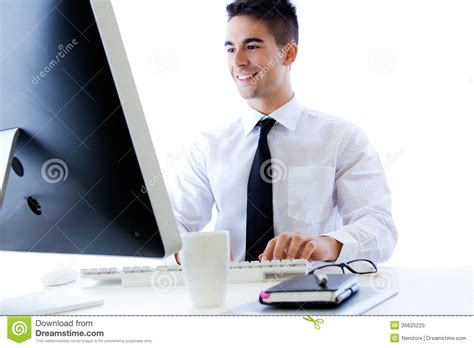 Happy Young Business Man Work In Modern Office On Computer Stock Image