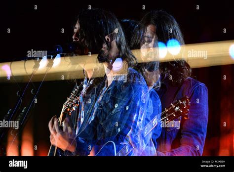A Multiple Exposure Photo Shows Dave Grohl Performing ‘my Hero During