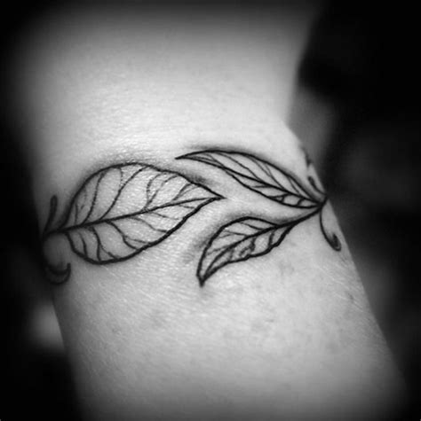 Black And White Leaves Tattoo On Wrist Tattoos Picture Tattoos