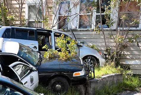 Police Chase Ends With Stolen Van Striking Vacant Home