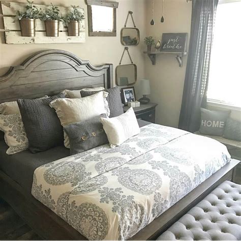 The best rooms look as though they've been decorated over time, like this one featuring a collection of distressed wood. 39 Best Farmhouse Bedroom Design and Decor Ideas for 2017