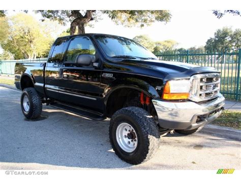 2000 Black Ford F350 Super Duty Lariat Extended Cab 4x4 41534127 Photo