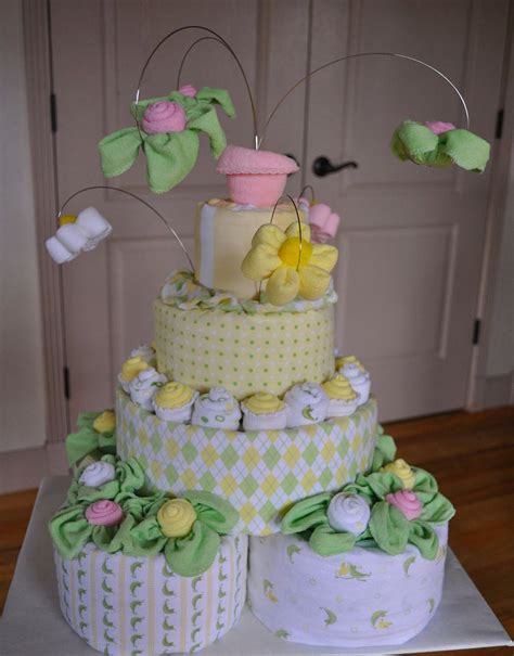 If you do not find what you are looking for send me a message as i have hundreds of themes/fabrics i have not been able to get to yet. 4 tier diaper cake | baby shower ideas | Pinterest