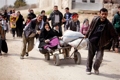 Thousands Of Syrians Flee As Two Major Battles Rage Middle East Eye