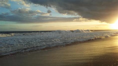 Pacific Ocean Waves During Sunset At Kekaha Beach Park In Kekaha On