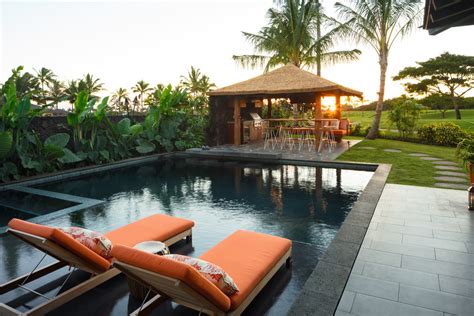 20 Mesmerizing Tropical Swimming Pool Designs That Will Take Your