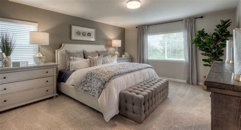 The Gray Accent Wall In This Master Suite Gives It An Elegant Feel