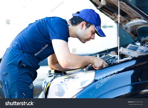 Mechanic Fixing Car Engine Stock Photo 377791249 Shutterstock