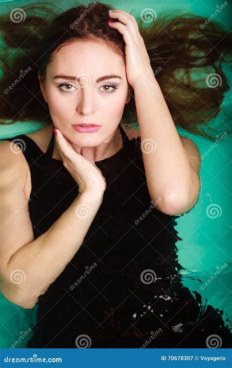 Seductive Woman In Black Dress In Water Stock Image Image Of Attractive Floating 70678307