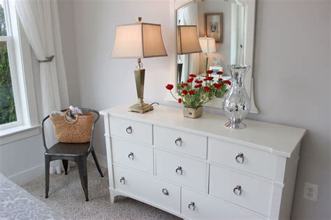 Finding a happy medium of what you should include on a nightstand depends on the person, but you want it to be a utility spot. Bedroom - #whitedresser #silvervase | Dresser as ...