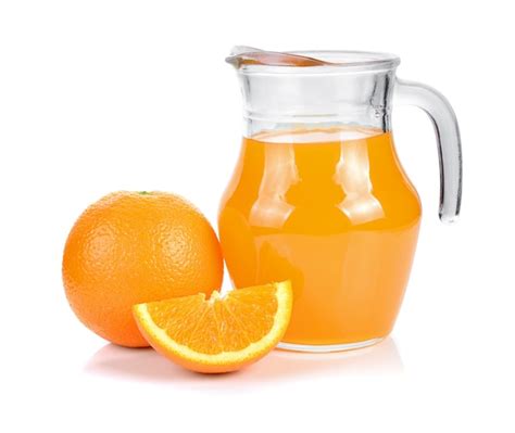 Premium Photo Orange Juice In Pitcher And Oranges Isolated
