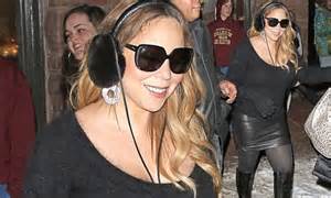 Mariah Carey Wears Hip Hugging Leather Skirt And High Heeled Boots
