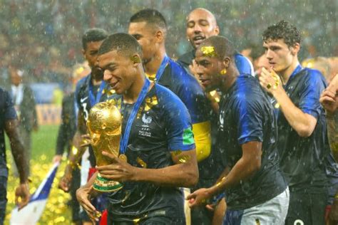 Switzerland fill face spain in the next round. Kylian Mbappe of France and his teammates celebrate victory with the FIFA World Cup trophy at ...
