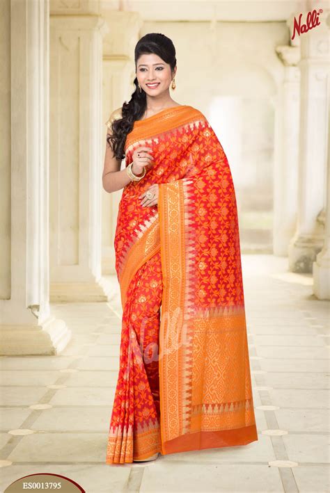 Look Stunning In This Red Banaras Silk Saree With Zari And Thread