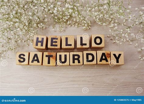 Hello Saturday Alphabet Letters On Wooden Background Stock Image