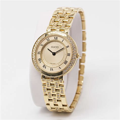A Ladies 18k Solid Yellow Gold And Diamond Gucci Bracelet Watch Circa