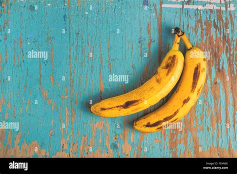 Two Old Ripe Bananas On Rustic Wooden Table Top View Stock Photo Alamy