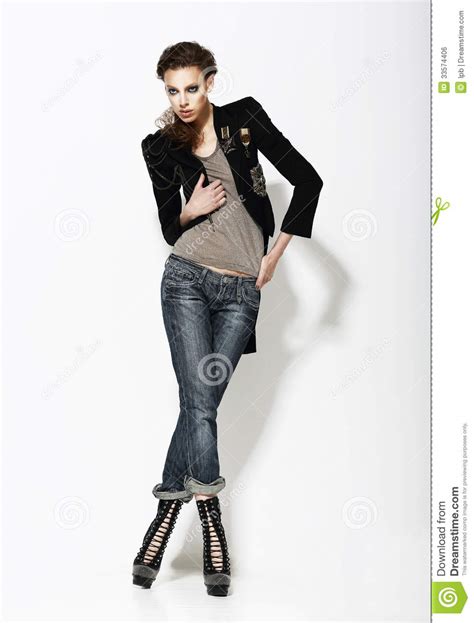 Vogue Full Length Portrait Of Stylish Woman In Informal Pose Stock