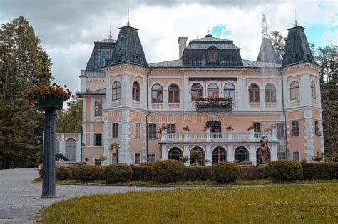 Beautiful Manor House Of Betliar In Slovakia Against A Blue Cloudy Sky
