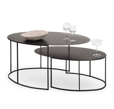 Our first item in today's list is a 19.1 h x 42.72 w x 13.8 d table that comes with three open cubbies which are perfect for storage needs or for showcasing items you want to see in your living room, such as books, plants, memorabilia, and others. Slim Irony Coffee table - Oval - H 29 cm 72 x 42 - Black ...