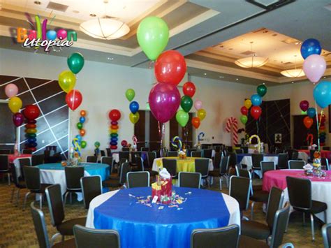 Pink & silver candy bar with organic balloon arch background for princess themed 4th birthday pink & silver candy bar. Balloon Decorations San Diego