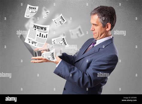 Middle aged businessman holding notebook and reading the explosive