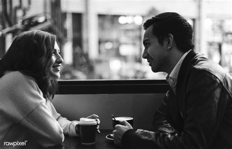Couple Drinking Coffee At A Cafe Free Image By