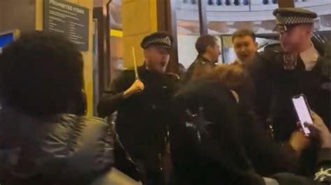 Police Officer Pushes Woman Down Stairs In Chaotic Scenes Outside Asake O2 Brixton Gig Mirror