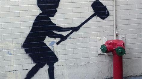 nypd after banksy artist graffitis upper west side [pics]