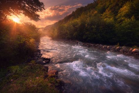 Beautiful Sunrise Over Fast Flowing Mountain River Summer Landscape