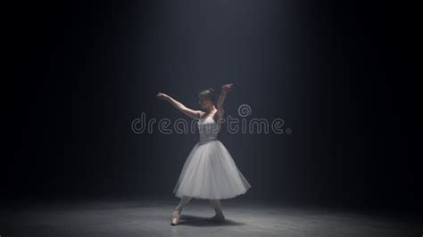 Sensual Ballerina Dancing On Stage Graceful Ballet Dancer Performing Indoors Stock Image
