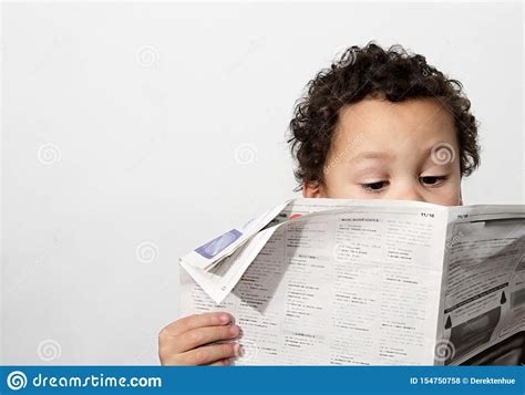 Little Boy Reading Newspaper Stock Photo Stock Photo Image Of