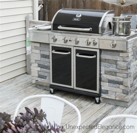 There are many different ways that you can design your outdoor one unique design is to build one from wood that resembles a kitchen countertop. DIY Outdoor Grill Stations & Kitchens • The Garden Glove