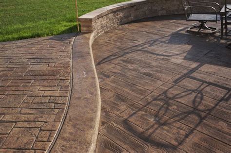 Stamped concrete turns ordinary concrete into something beautiful. Wood plank stamped concrete patio | Wood stamped concrete ...