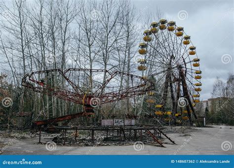 Abandoned Carousel And Abandoned Ferris At An Amusement Park In The